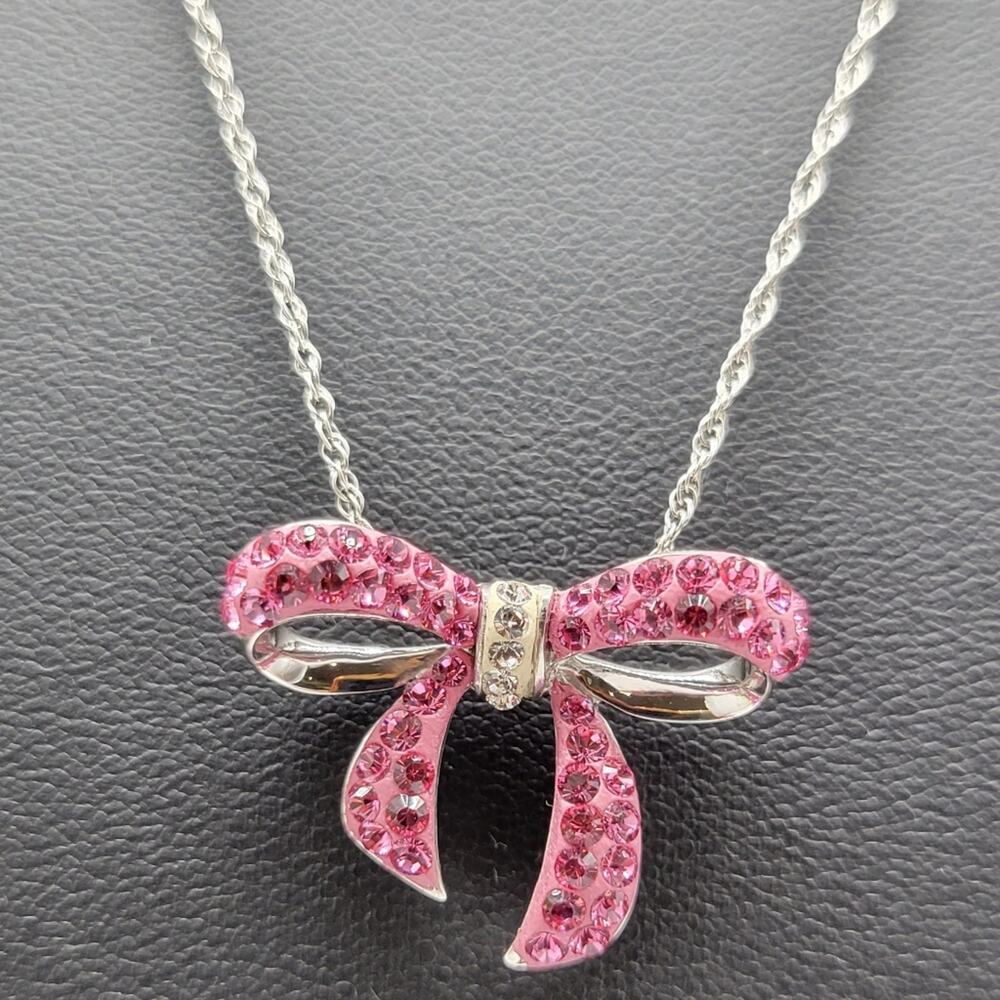 Sterling silver pink bow pendant necklace